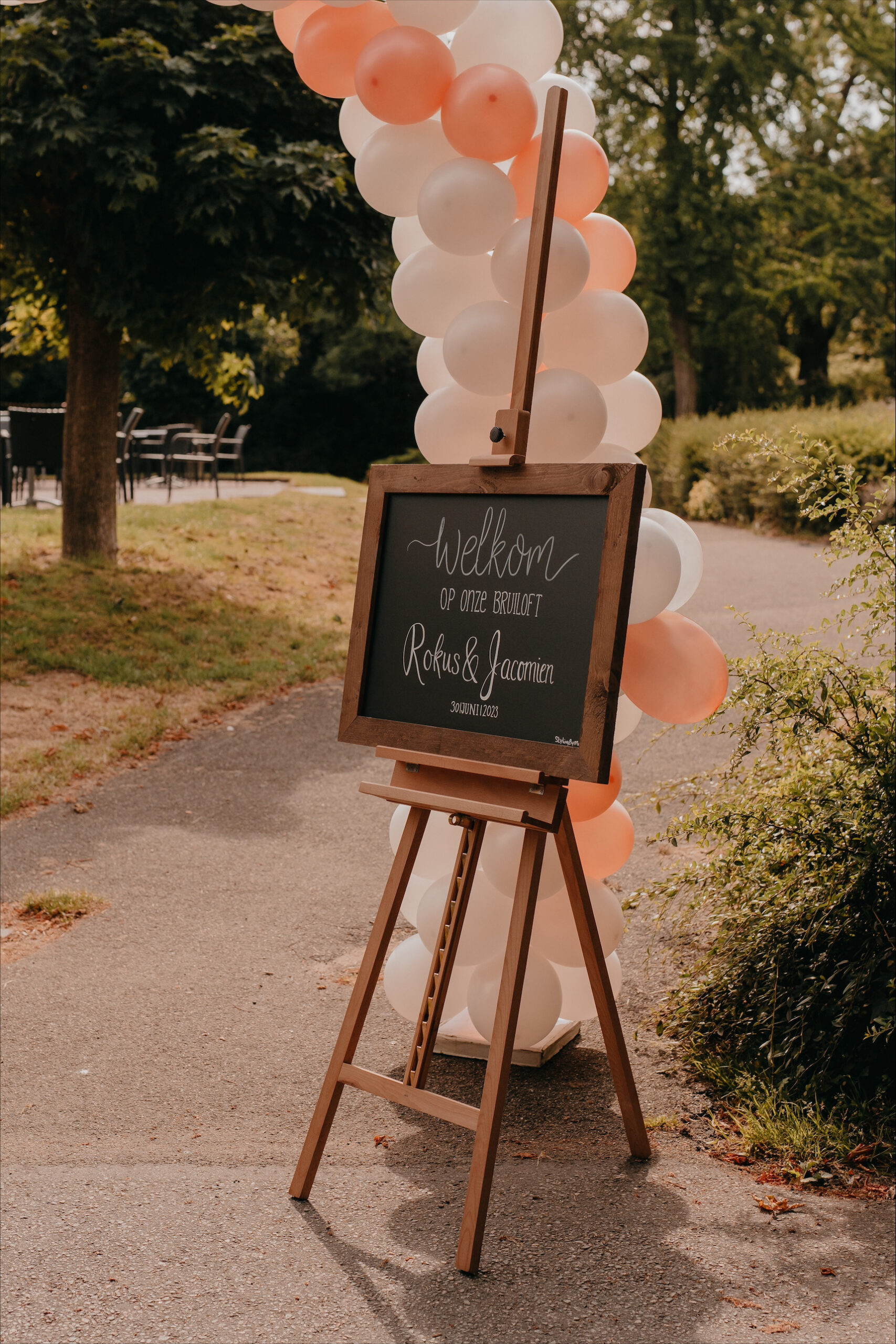 Welkomstbord met houten rand